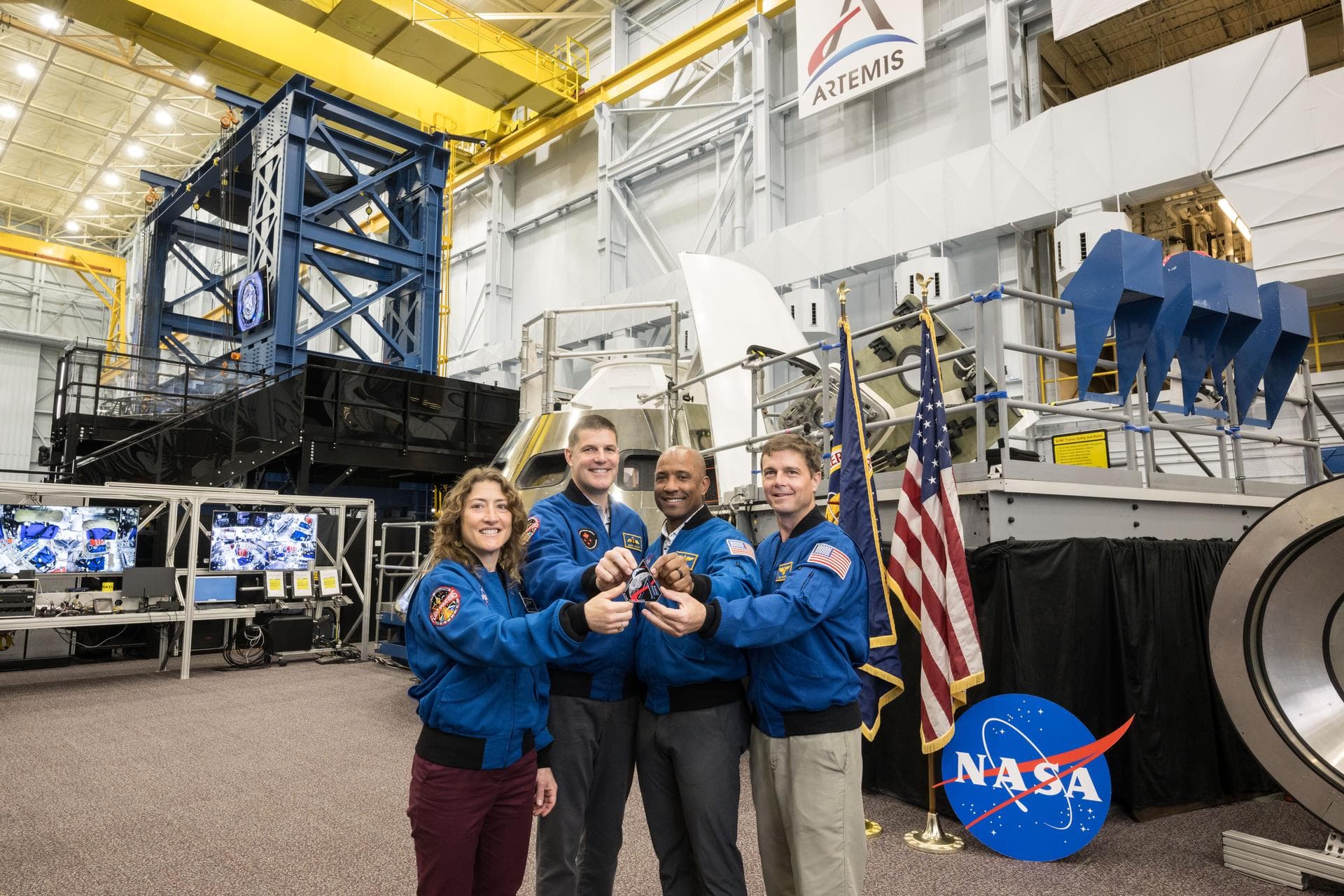 Artemis II Crew with Mission Patch